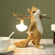Charming LED squirrel table lamp – Stylish resin and glass accent for your space
