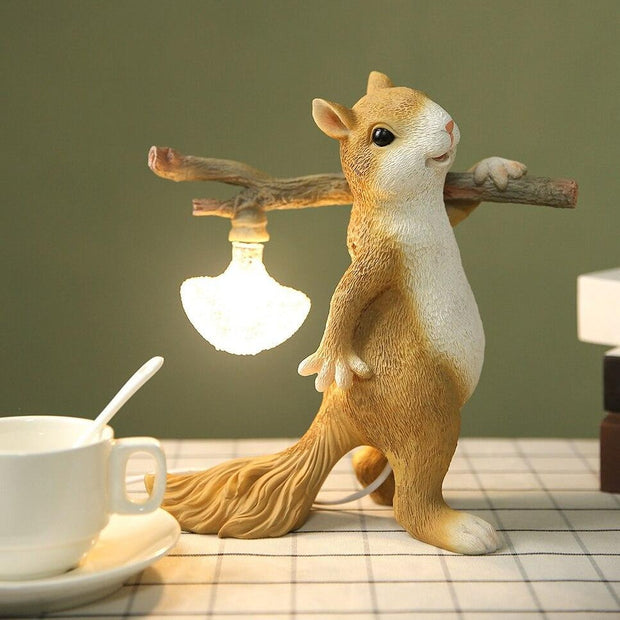 Charming LED squirrel table lamp – Stylish resin and glass accent for your space