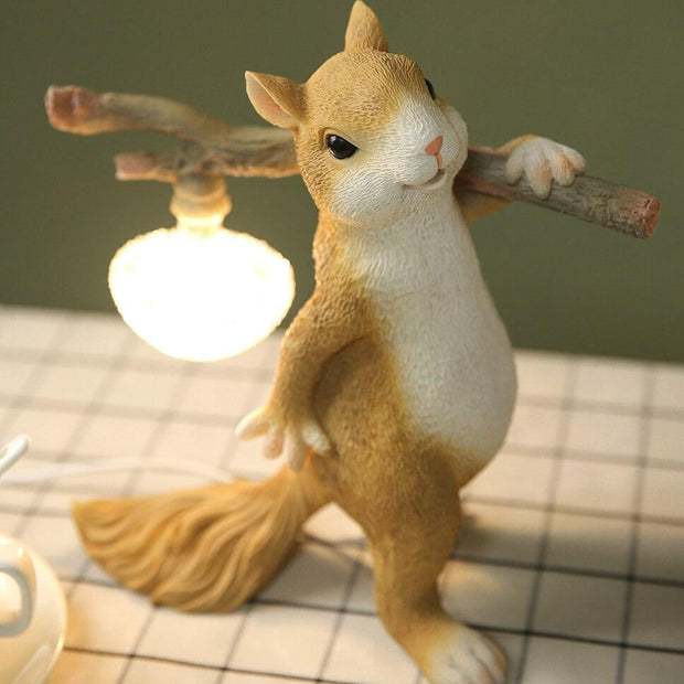 Charming LED squirrel table lamp – Stylish resin and glass accent for your space