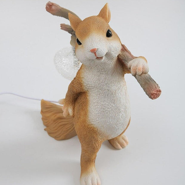 Charming LED squirrel table lamp – Stylish resin and glass accent for your space