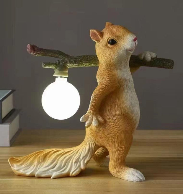 Charming LED squirrel table lamp – Stylish resin and glass accent for your space