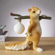 Charming LED squirrel table lamp – Stylish resin and glass accent for your space