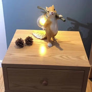 Charming LED squirrel table lamp – Stylish resin and glass accent for your space