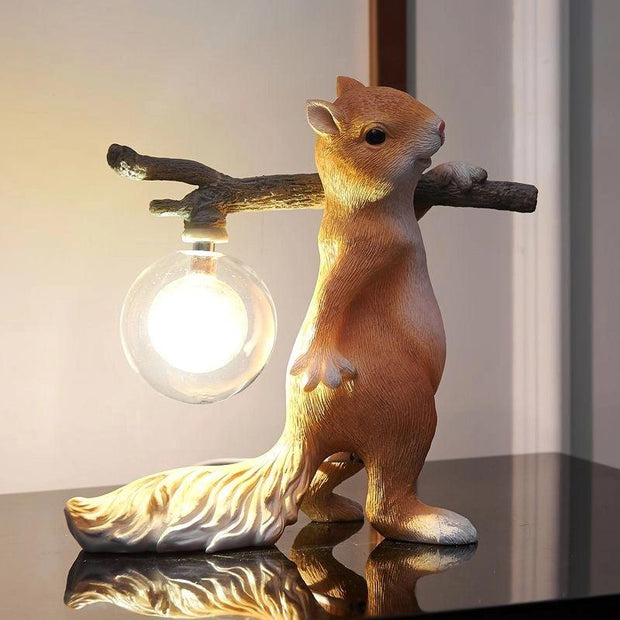 Charming LED squirrel table lamp – Stylish resin and glass accent for your space
