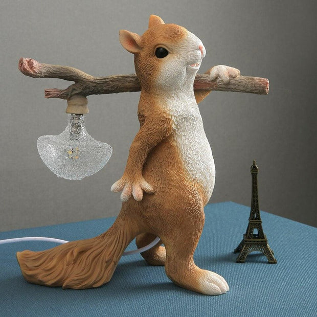 Charming LED squirrel table lamp – Stylish resin and glass accent for your space