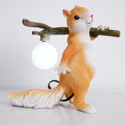Charming LED squirrel table lamp – Stylish resin and glass accent for your space
