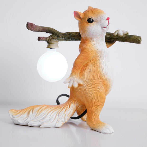 Charming LED squirrel table lamp – Stylish resin and glass accent for your space