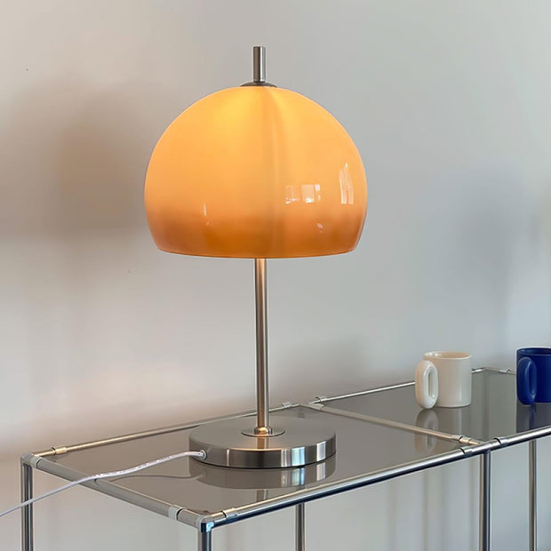 Elegantly designed Bauhaus table lamp by Pilz – Chic fusion of glass and metal with warm amber lampshade