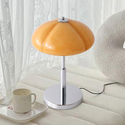 Elegantly designed Bauhaus table lamp by Pilz – Chic fusion of glass and metal with warm amber lampshade