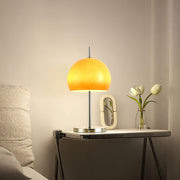Elegantly designed Bauhaus table lamp by Pilz – Chic fusion of glass and metal with warm amber lampshade