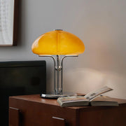Elegantly designed Bauhaus table lamp by Pilz – Chic fusion of glass and metal with warm amber lampshade