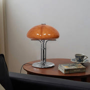 Elegantly designed Bauhaus table lamp by Pilz – Chic fusion of glass and metal with warm amber lampshade