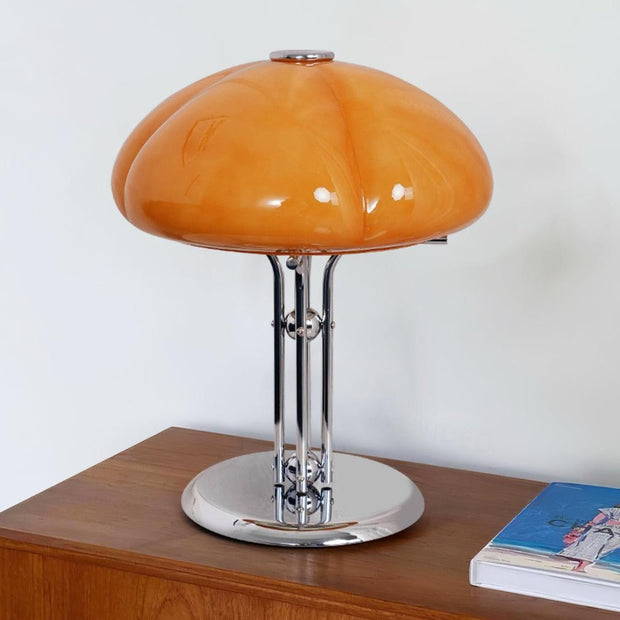 Elegantly designed Bauhaus table lamp by Pilz – Chic fusion of glass and metal with warm amber lampshade