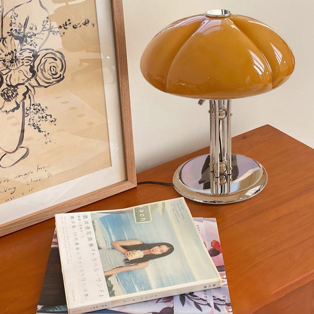 Elegantly designed Bauhaus table lamp by Pilz – Chic fusion of glass and metal with warm amber lampshade