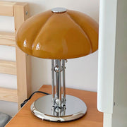 Elegantly designed Bauhaus table lamp by Pilz – Chic fusion of glass and metal with warm amber lampshade