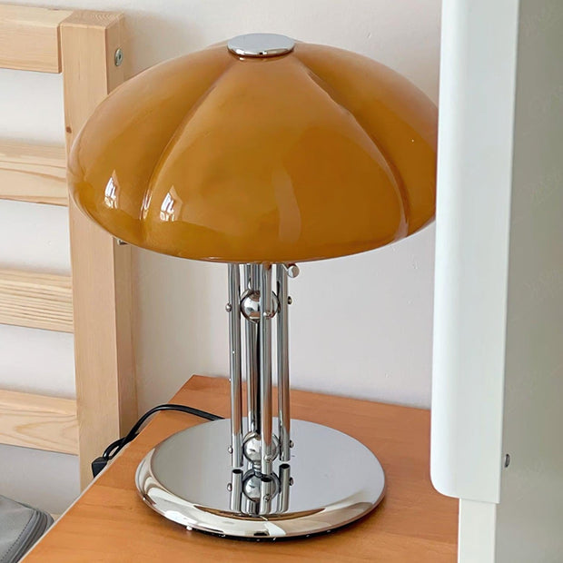 Elegantly designed Bauhaus table lamp by Pilz – Chic fusion of glass and metal with warm amber lampshade