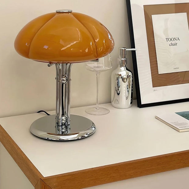 Elegantly designed Bauhaus table lamp by Pilz – Chic fusion of glass and metal with warm amber lampshade