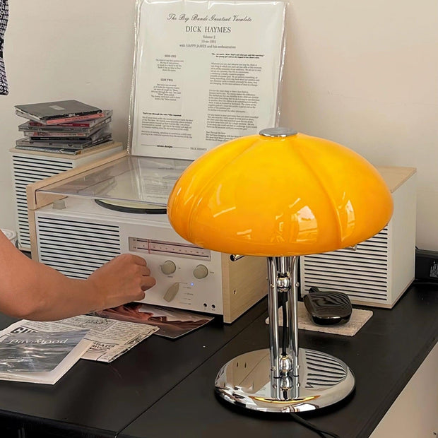 Elegantly designed Bauhaus table lamp by Pilz – Chic fusion of glass and metal with warm amber lampshade