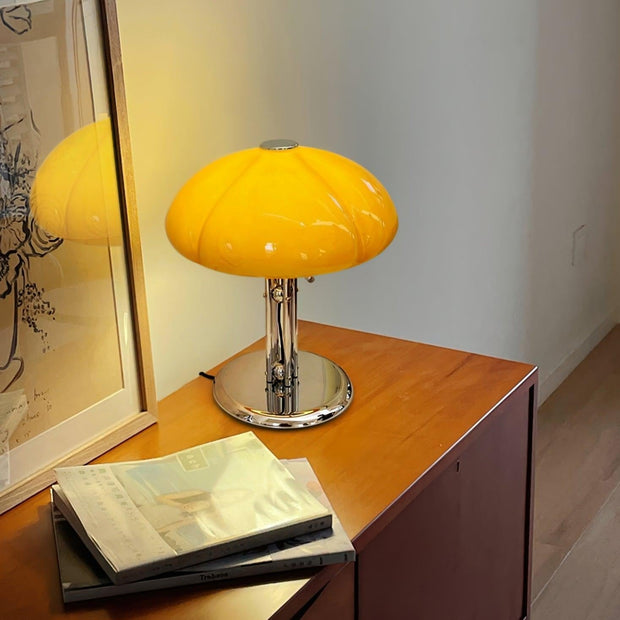 Elegantly designed Bauhaus table lamp by Pilz – Chic fusion of glass and metal with warm amber lampshade