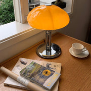 Elegantly designed Bauhaus table lamp by Pilz – Chic fusion of glass and metal with warm amber lampshade
