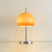 Elegantly designed Bauhaus table lamp by Pilz – Chic fusion of glass and metal with warm amber lampshade