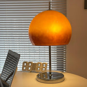 Elegantly designed Bauhaus table lamp by Pilz – Chic fusion of glass and metal with warm amber lampshade