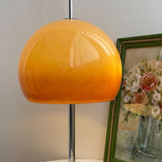 Elegantly designed Bauhaus table lamp by Pilz – Chic fusion of glass and metal with warm amber lampshade