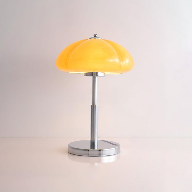 Elegantly designed Bauhaus table lamp by Pilz – Chic fusion of glass and metal with warm amber lampshade