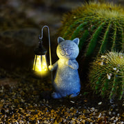 Enchanted golden solar cat statue - Stunning outdoor decor with illuminating LED lights