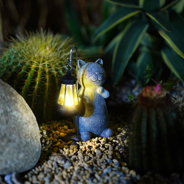 Enchanted golden solar cat statue - Stunning outdoor decor with illuminating LED lights