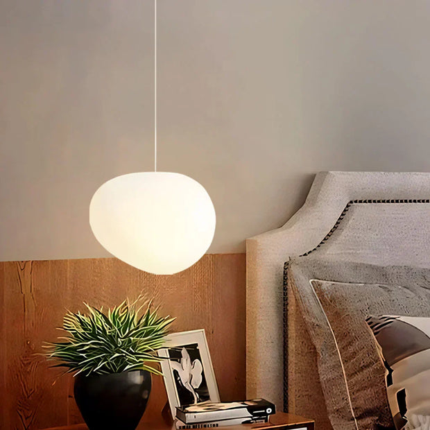 Elegant modern LED lamp with natural stone accents and opal glass