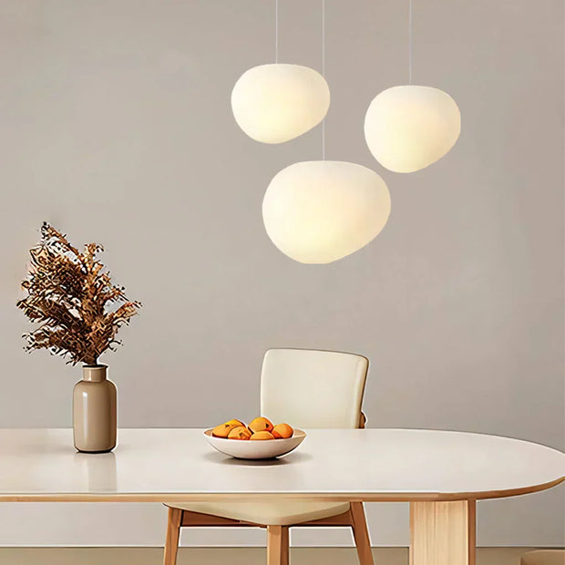 Elegant modern LED lamp with natural stone accents and opal glass