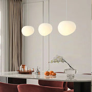 Elegant modern LED lamp with natural stone accents and opal glass