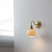 Elevate your space with our beautiful brass and ceramic wall sconce – A touch of classic elegance for timeless interiors