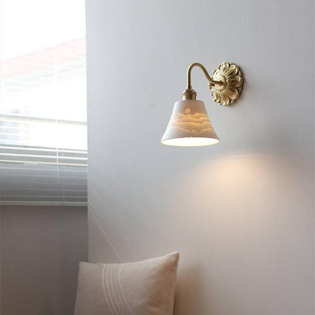 Elevate your space with our beautiful brass and ceramic wall sconce – A touch of classic elegance for timeless interiors