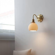Elevate your space with our beautiful brass and ceramic wall sconce – A touch of classic elegance for timeless interiors