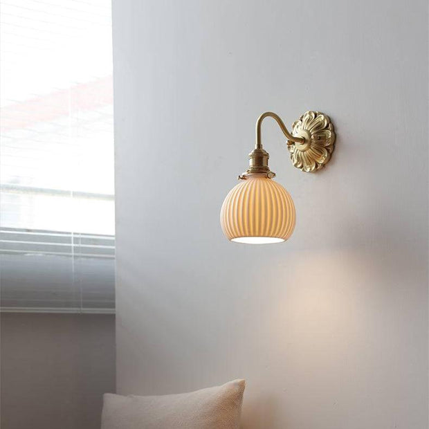 Elevate your space with our beautiful brass and ceramic wall sconce – A touch of classic elegance for timeless interiors