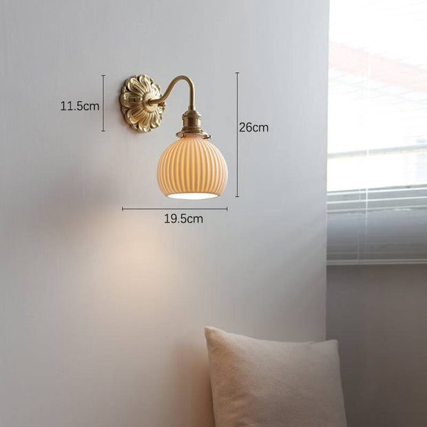 Elevate your space with our beautiful brass and ceramic wall sconce – A touch of classic elegance for timeless interiors