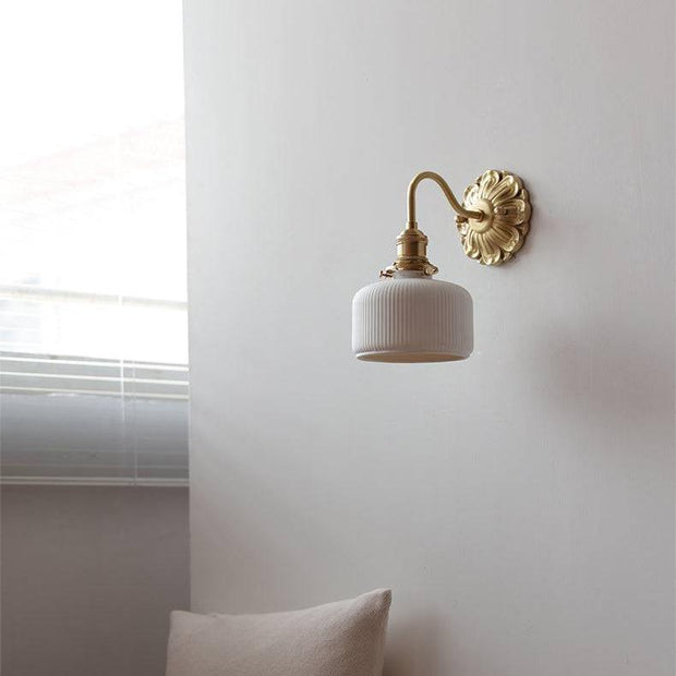 Elevate your space with our beautiful brass and ceramic wall sconce – A touch of classic elegance for timeless interiors