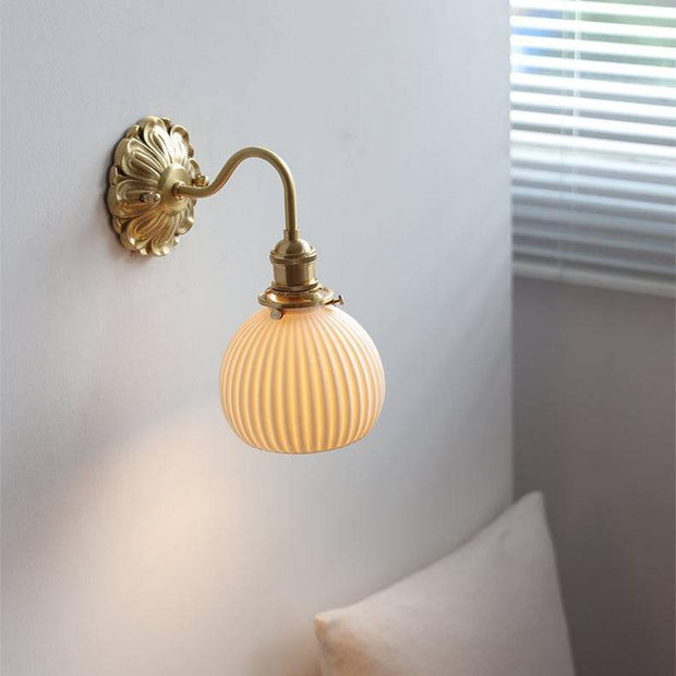 Elevate your space with our beautiful brass and ceramic wall sconce – A touch of classic elegance for timeless interiors