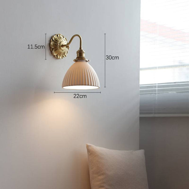 Elevate your space with our beautiful brass and ceramic wall sconce – A touch of classic elegance for timeless interiors