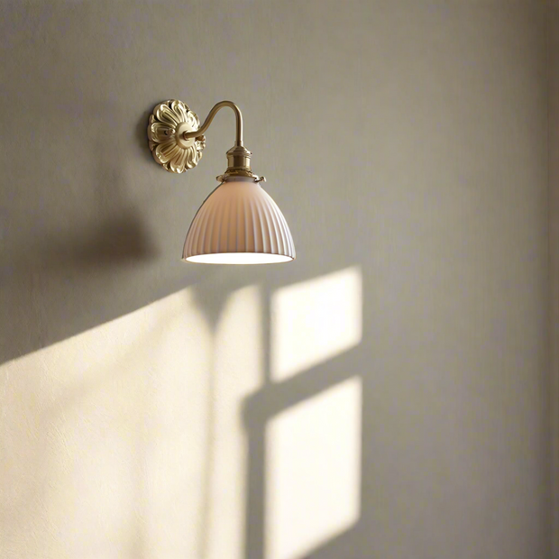 Elevate your space with our beautiful brass and ceramic wall sconce – A touch of classic elegance for timeless interiors