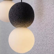 Magnificent Origo Pendant Light – Modern Geometric Style Made from Volcanic Stone with an Elegant Opal Glass Diffuser