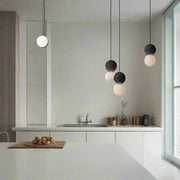 Magnificent Origo Pendant Light – Modern Geometric Style Made from Volcanic Stone with an Elegant Opal Glass Diffuser
