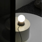 Dazzling geometric pendant light Origo – Made from volcanic stone and opal glass