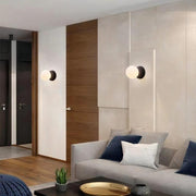 Dazzling geometric pendant light Origo – Made from volcanic stone and opal glass