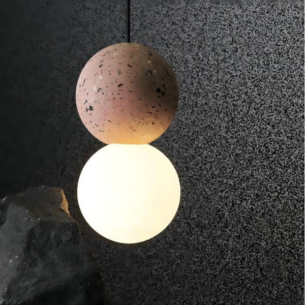 Dazzling geometric pendant light Origo – Made from volcanic stone and opal glass
