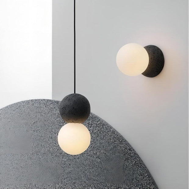 Dazzling geometric pendant light Origo – Made from volcanic stone and opal glass