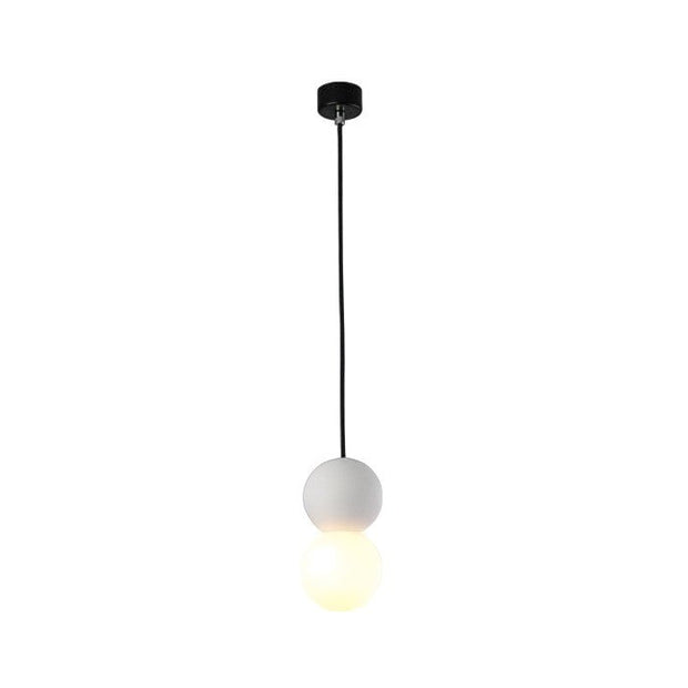 Dazzling geometric pendant light Origo – Made from volcanic stone and opal glass
