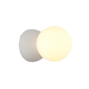 Dazzling geometric pendant light Origo – Made from volcanic stone and opal glass